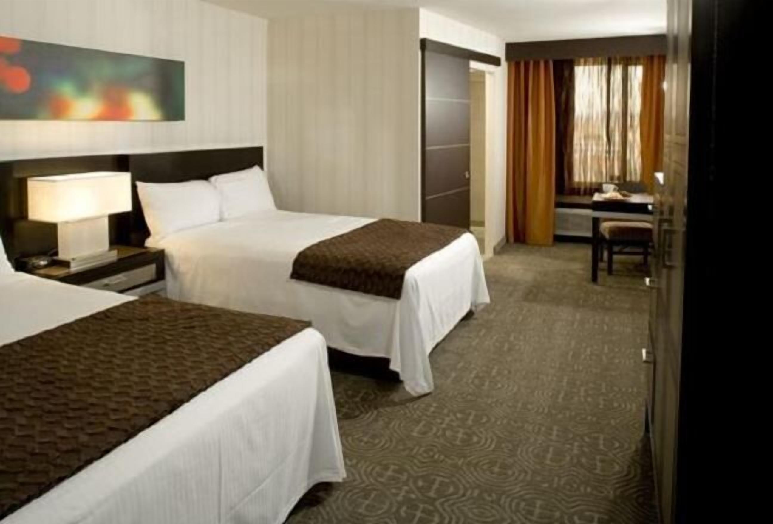 In-room safe, blackout curtains, iron/ironing board, cots/infant beds