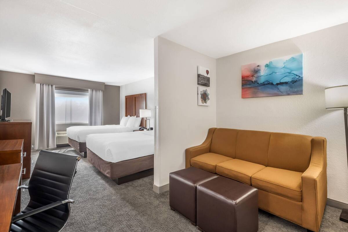 Suite (2 Queen bed with Sofabed, Non Smoking) | Desk, iron/ironing board, WiFi (free), bed sheets