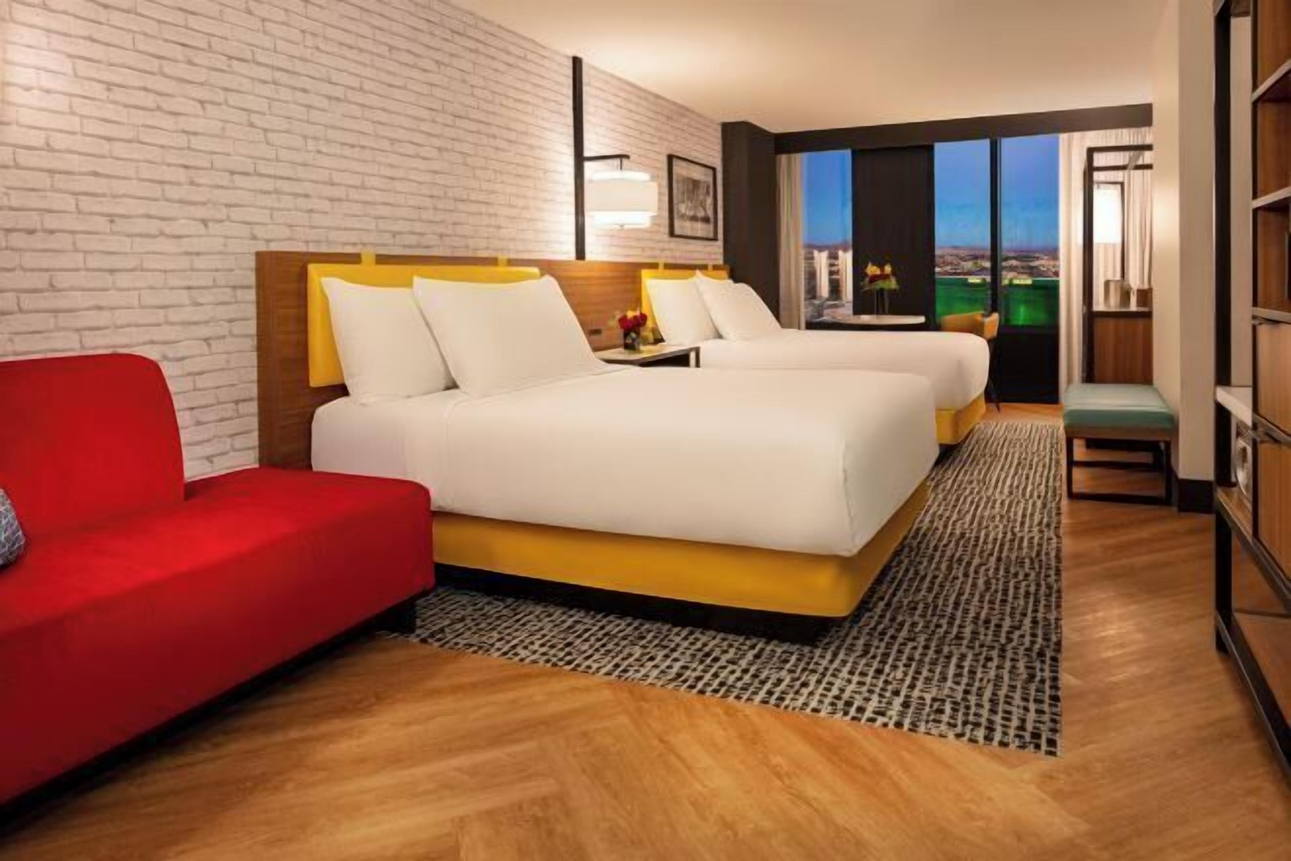 Premium bedding, pillowtop beds, in-room safe, blackout drapes