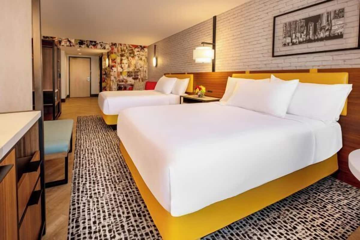 Premium bedding, pillow-top beds, in-room safe, blackout curtains