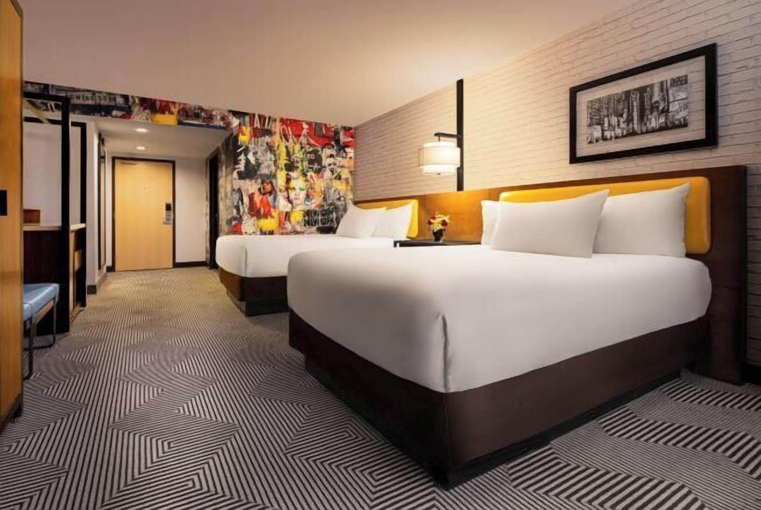 Premium bedding, pillowtop beds, in-room safe, blackout drapes