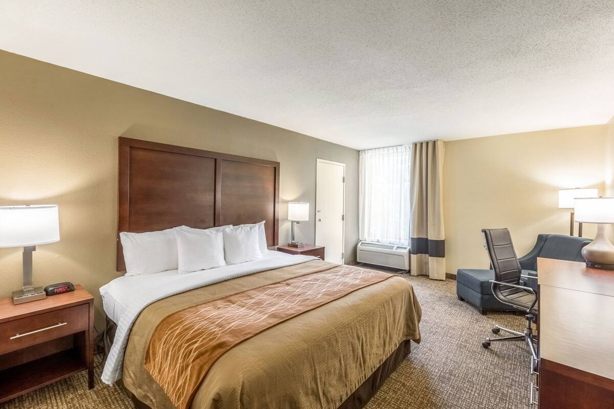 Down comforters, desk, laptop workspace, blackout drapes