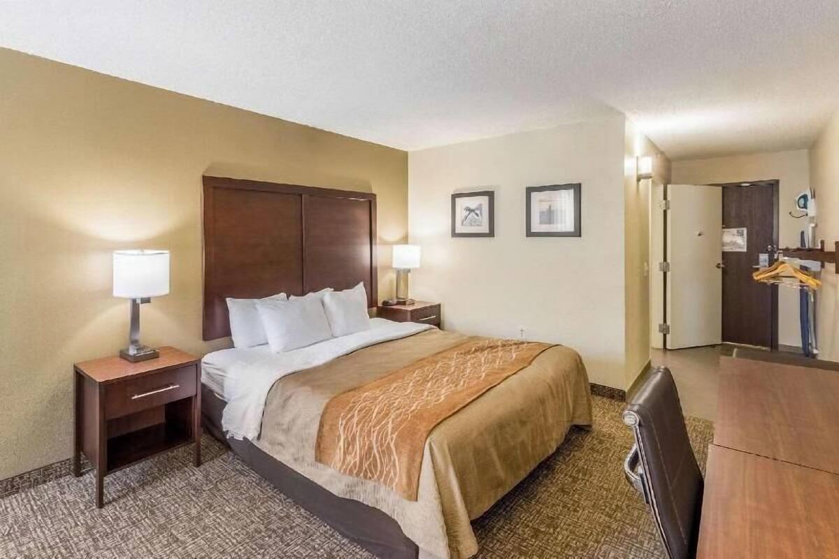 Down comforters, desk, laptop workspace, blackout drapes