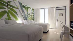 Ropa de cama de alta calidad y caja de seguridad en la habitación