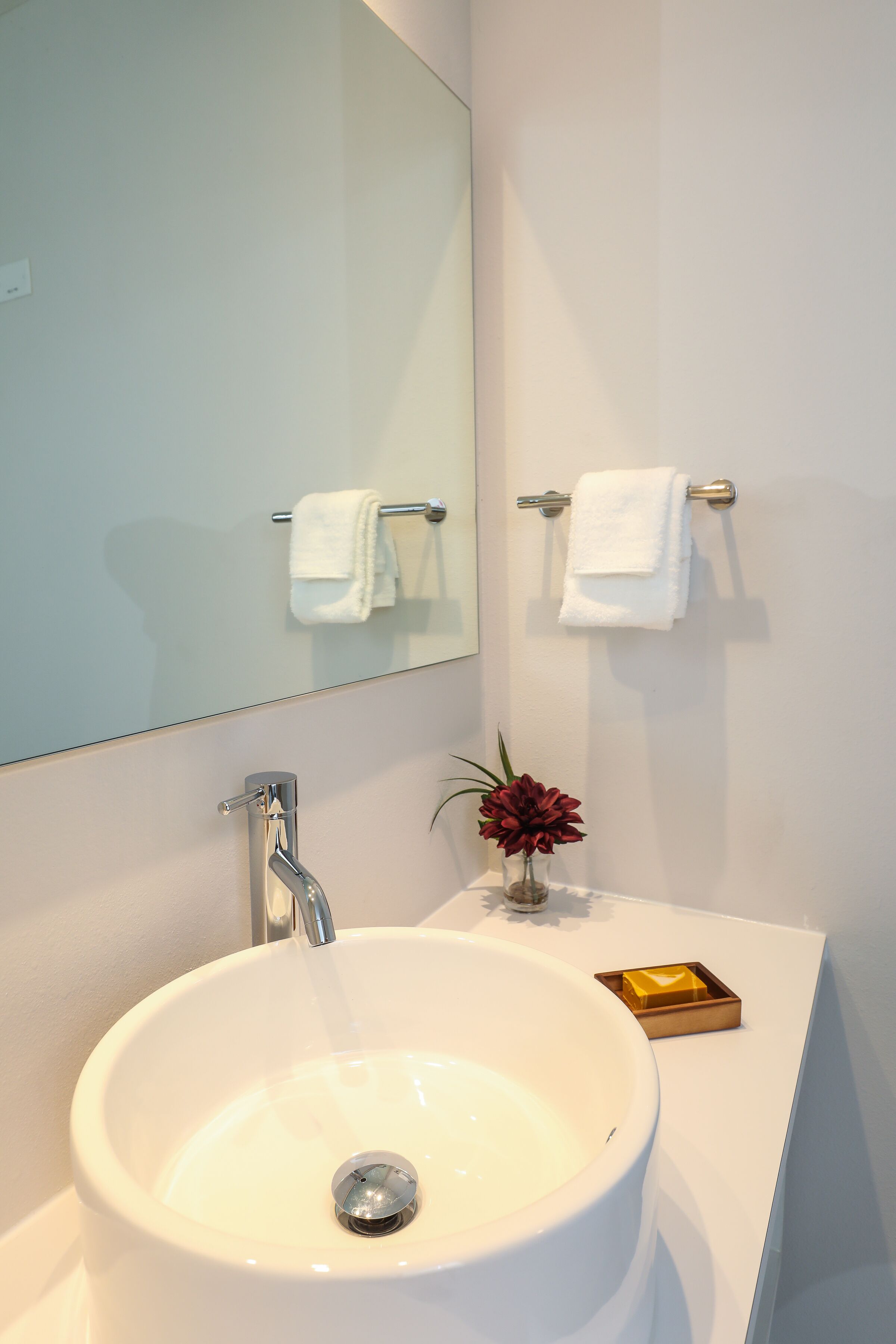 combined shower/bathtub, rainfall showerhead, designer toiletries