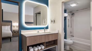 Designer toiletries, hair dryer, towels, soap