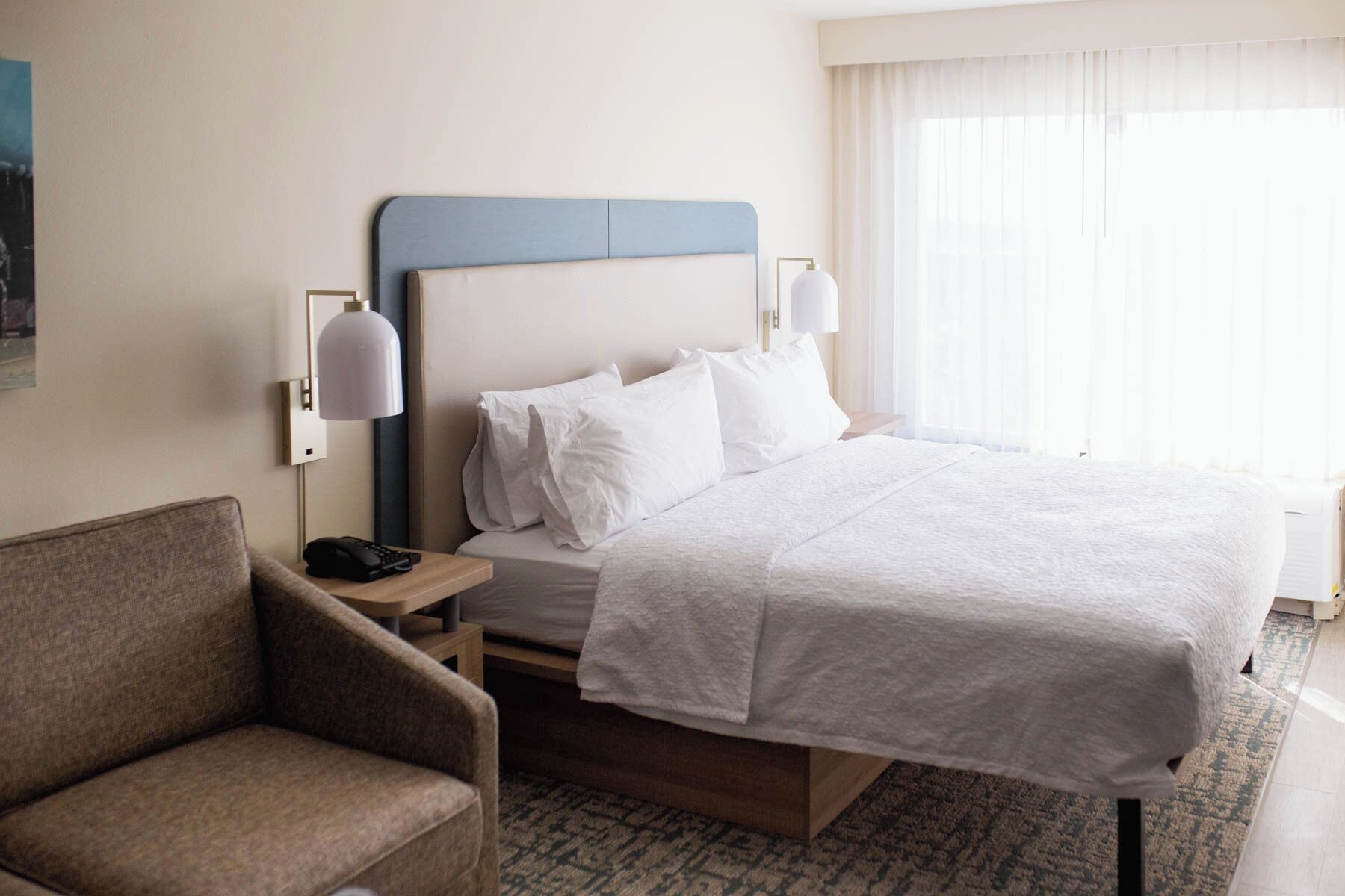 premium bedding, desk, laptop workspace, blackout curtains