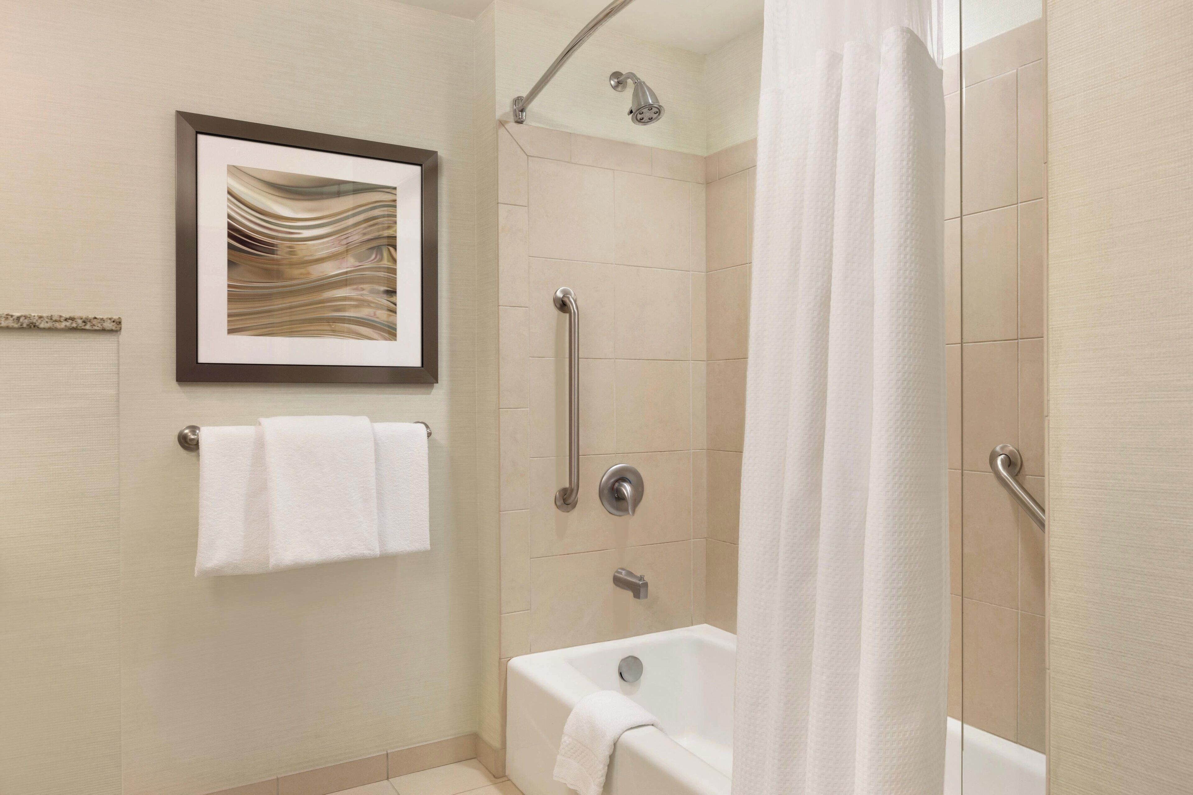 combined shower/bathtub, free toiletries, hair dryer, towels