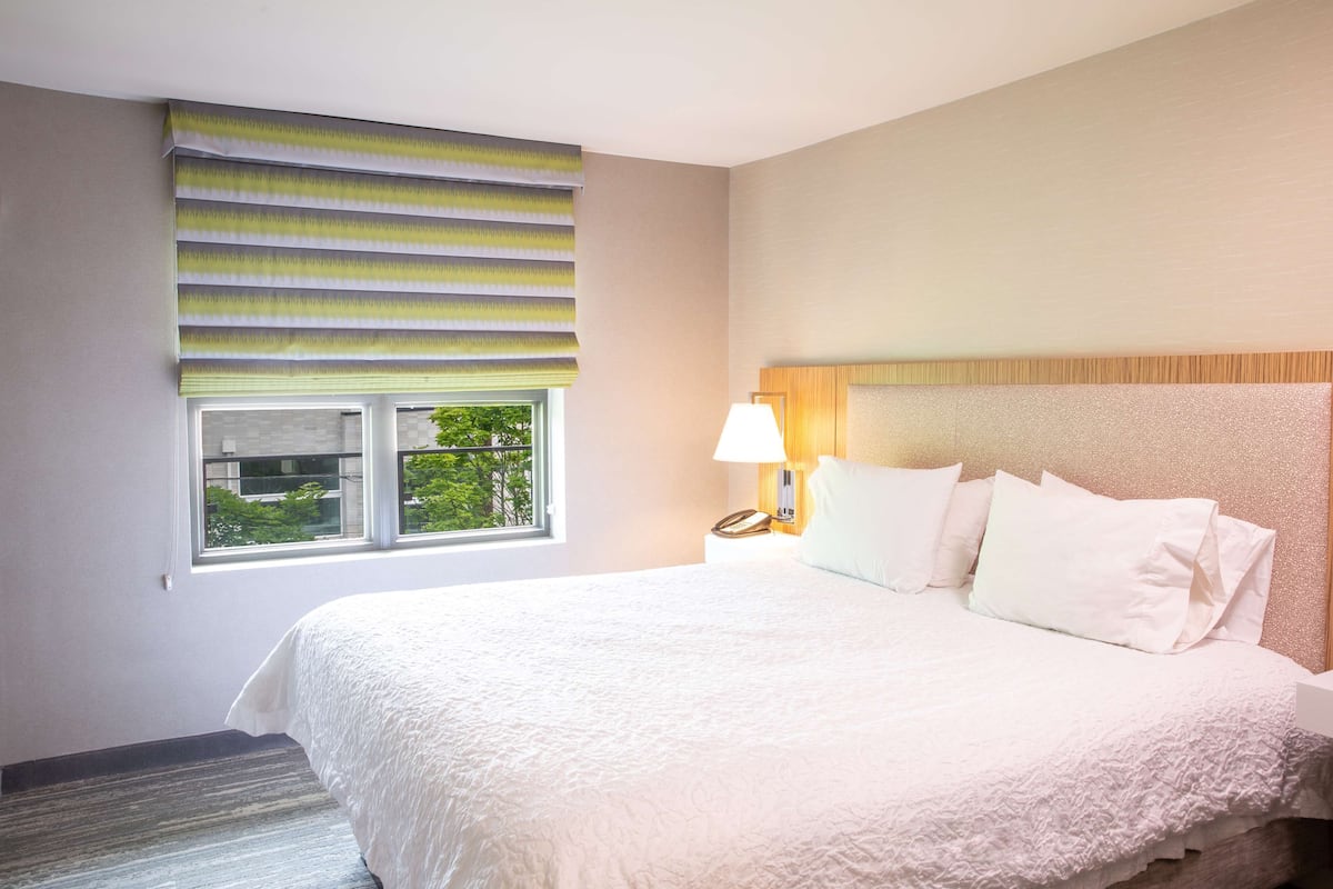 Suite, 2 Bedrooms | Premium bedding, desk, iron/ironing board, free cribs/infant beds