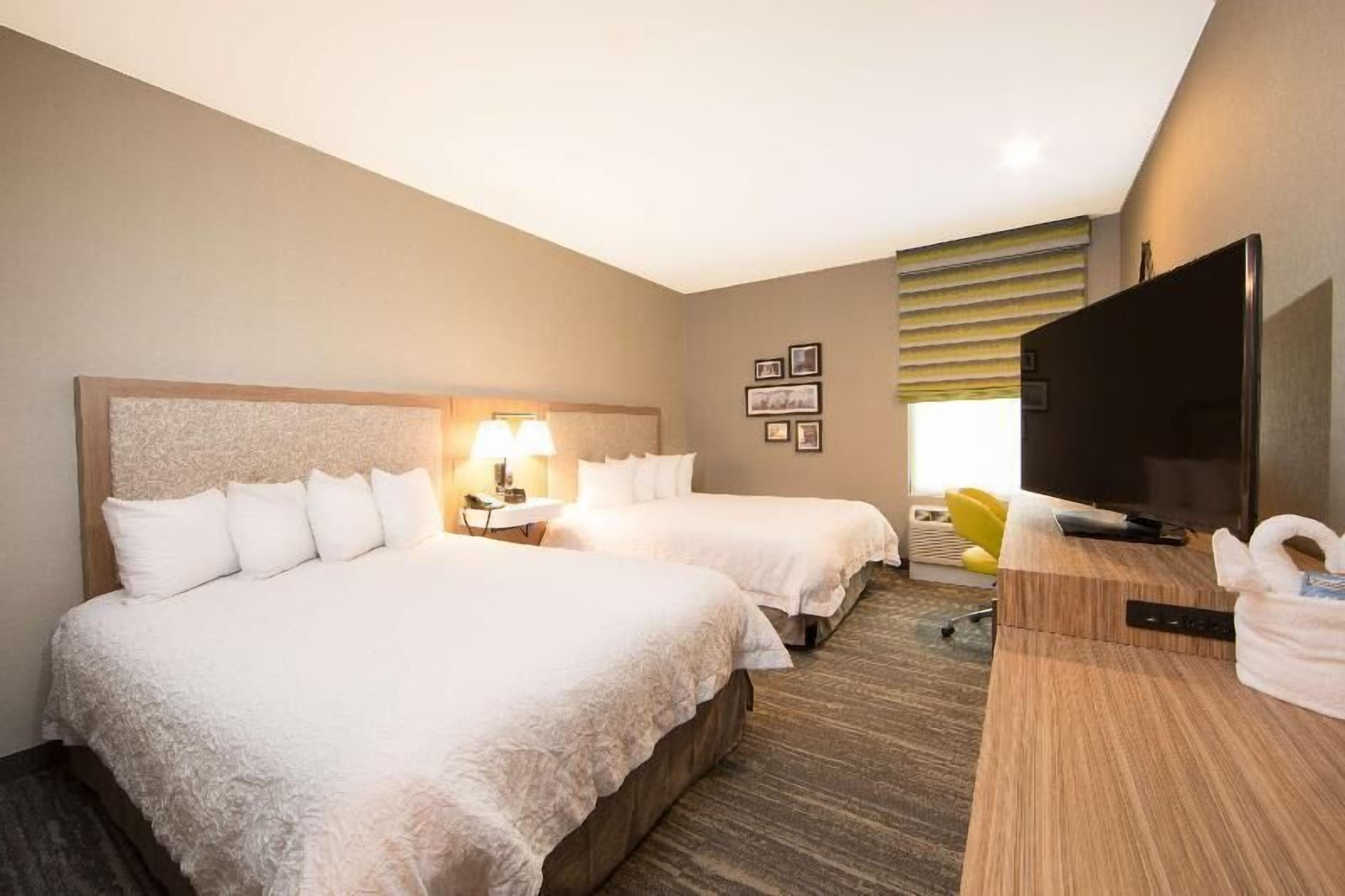 Premium bedding, desk, iron/ironing board, free cots/infant beds