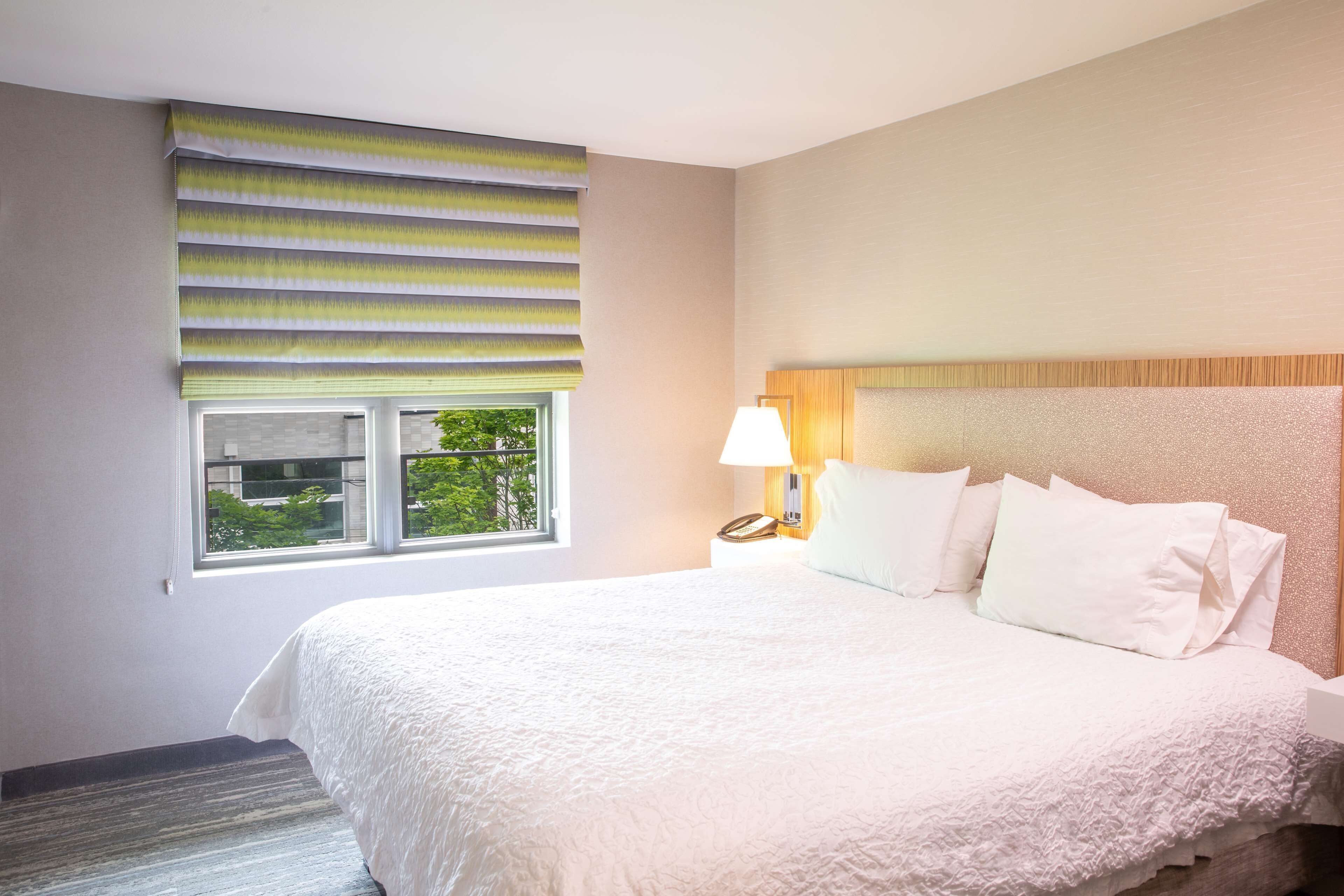 Premium bedding, desk, iron/ironing board, free cribs/infant beds