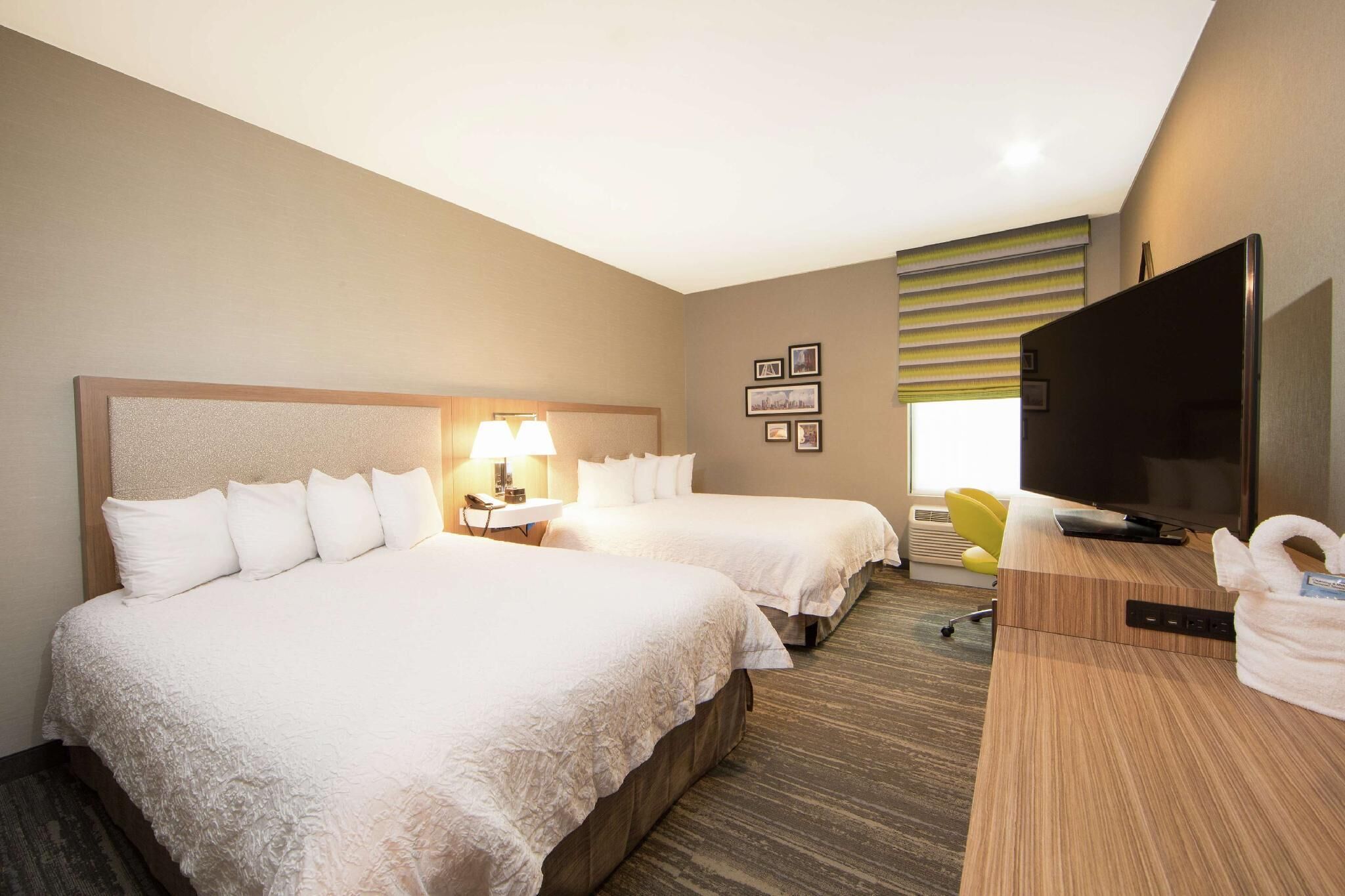 Premium bedding, desk, iron/ironing board, free cots/infant beds