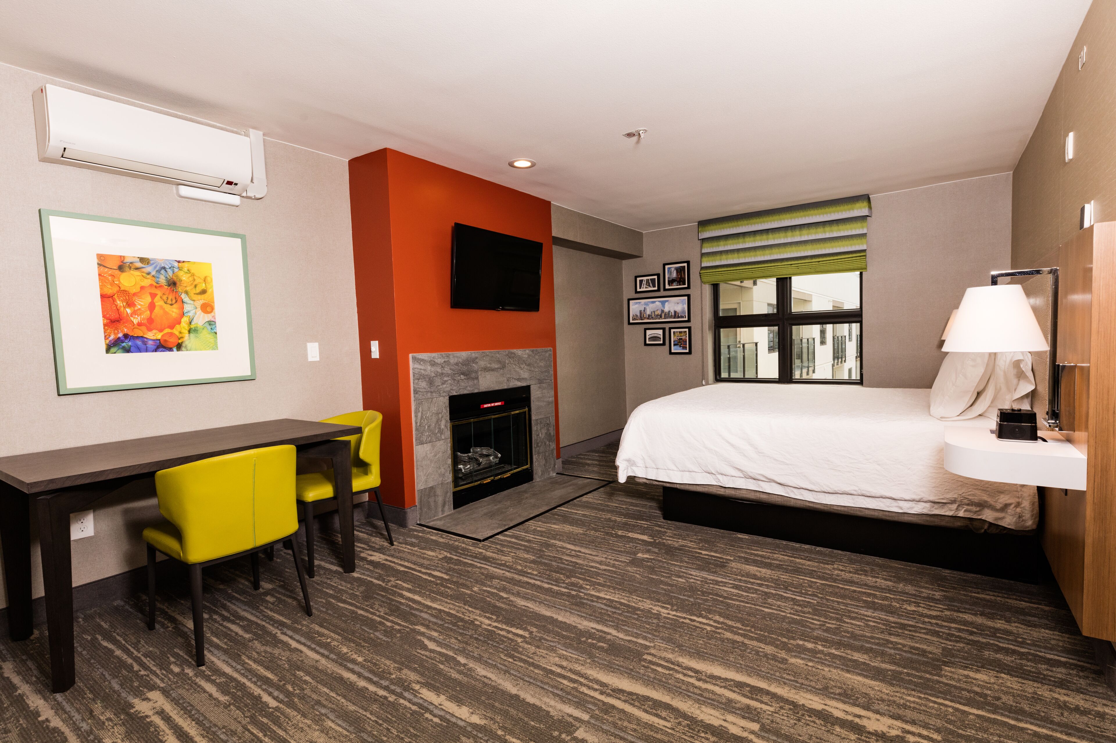 room, 1 queen bed, kitchen | premium bedding, desk, iron/ironing board, free cots/infant beds