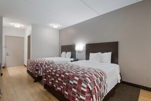 Deluxe Room, 2 Queen Beds, Non Smoking | Blackout drapes, iron/ironing board, free cribs/infant beds, free WiFi
