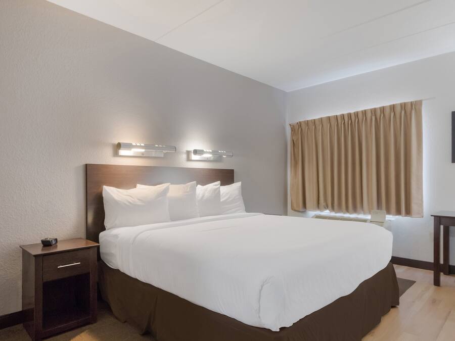 Suite, 1 King Bed, Non Smoking | Blackout drapes, iron/ironing board, free cribs/infant beds, free WiFi