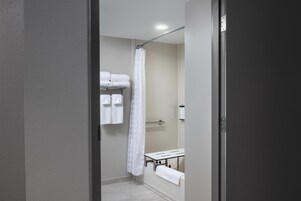 Room, Multiple Beds, Bathtub | Bathroom | Combined shower/tub, designer toiletries, hair dryer, towels