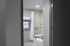 Combined shower/bathtub, designer toiletries, hair dryer, towels