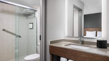Combined shower/bathtub, designer toiletries, hair dryer, towels