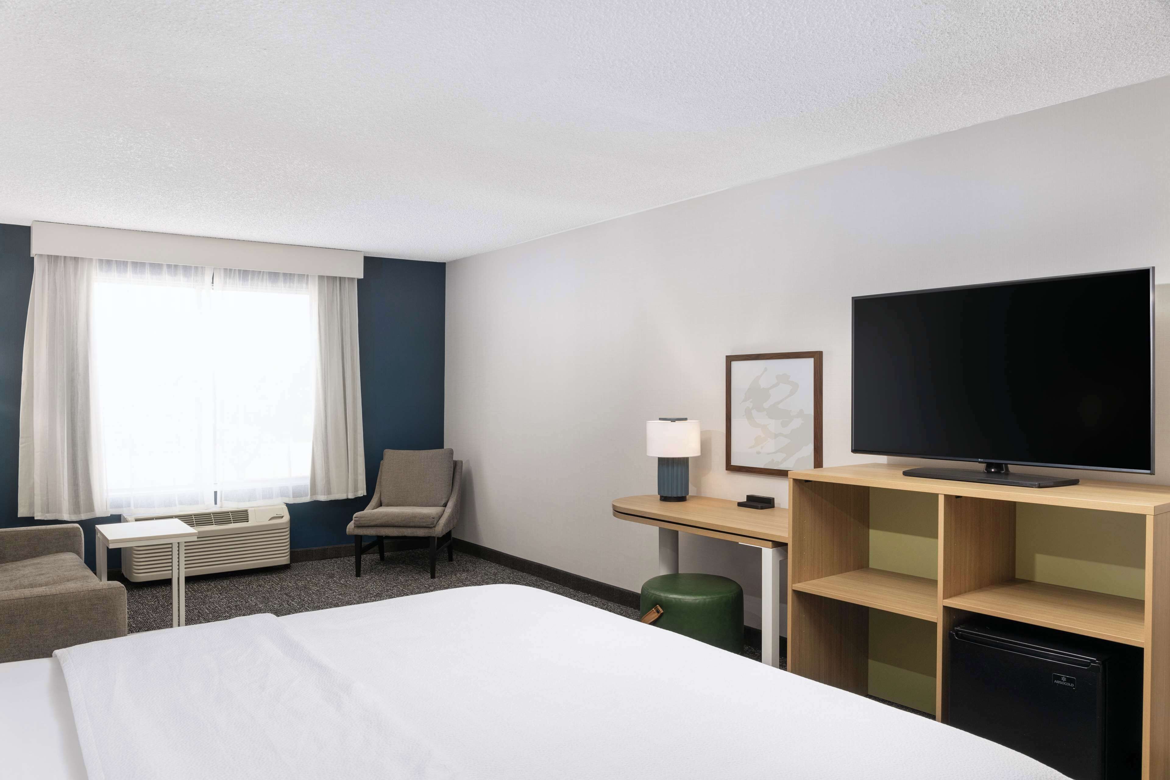 room, 1 king bed with sofa bed | premium bedding, desk, soundproofing, iron/ironing board