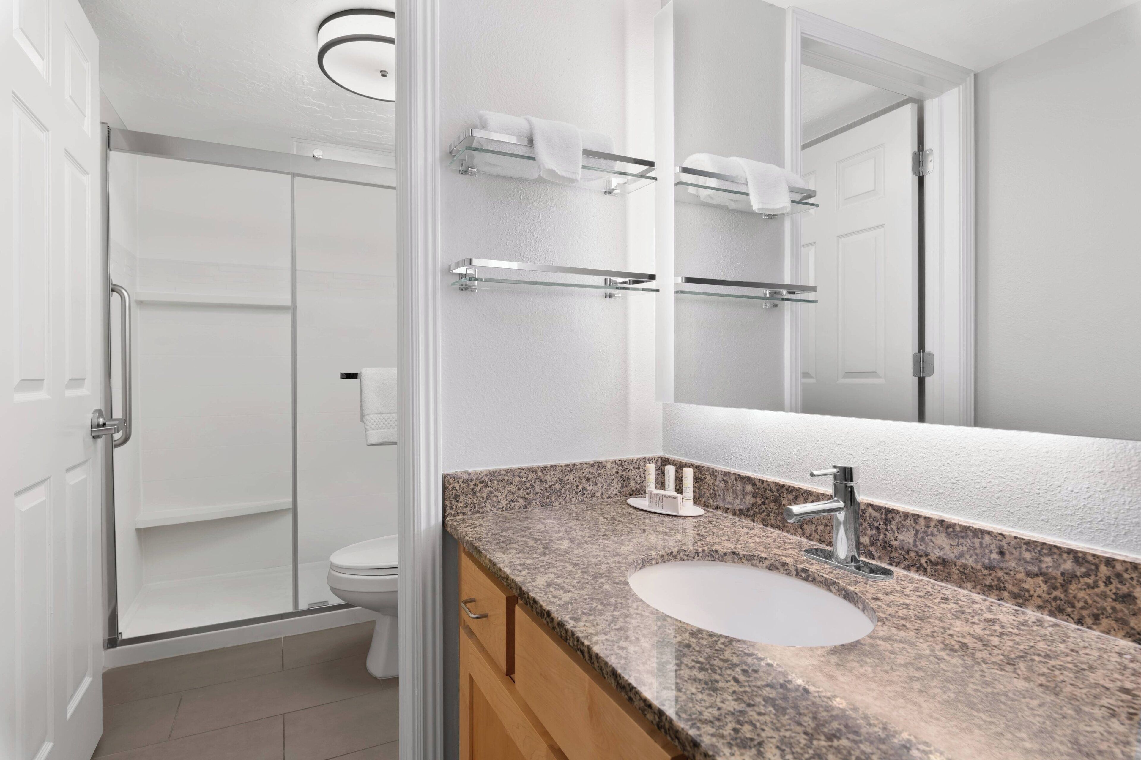 combined shower/bathtub, free toiletries, hair dryer, towels