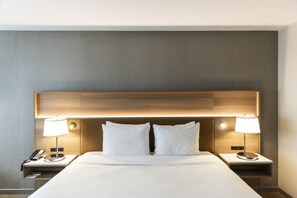 Premium bedding, down duvets, in-room safe, desk
