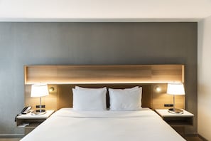 Premium bedding, down duvets, in-room safe, desk