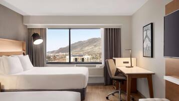 Premium bedding, down comforters, in-room safe, desk