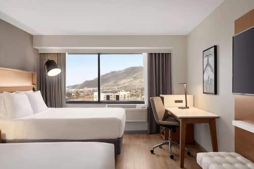 Premium bedding, down comforters, in-room safe, desk