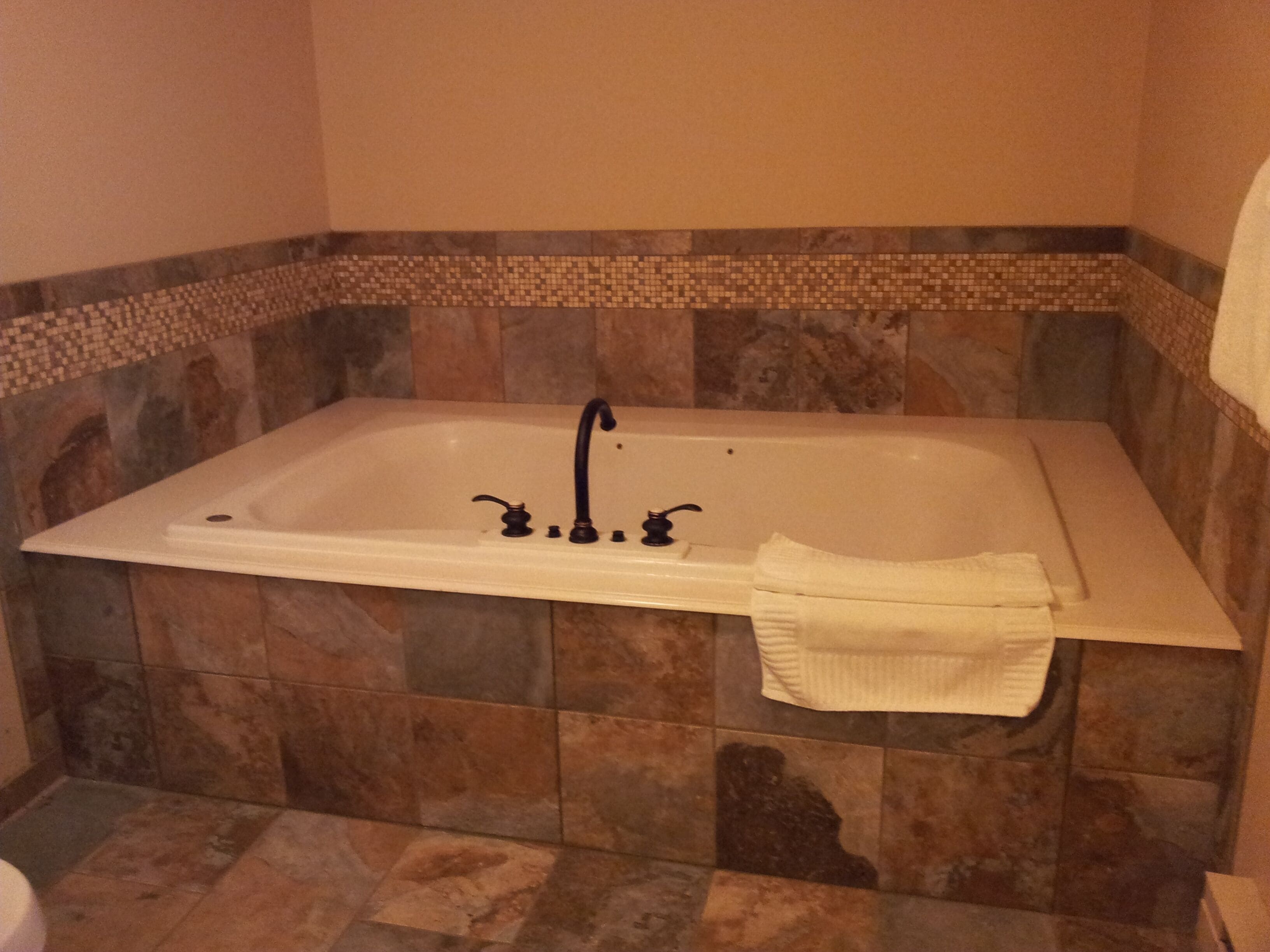 room, 1 king bed, jetted tub, courtyard area (stair access only) | jetted bathtub