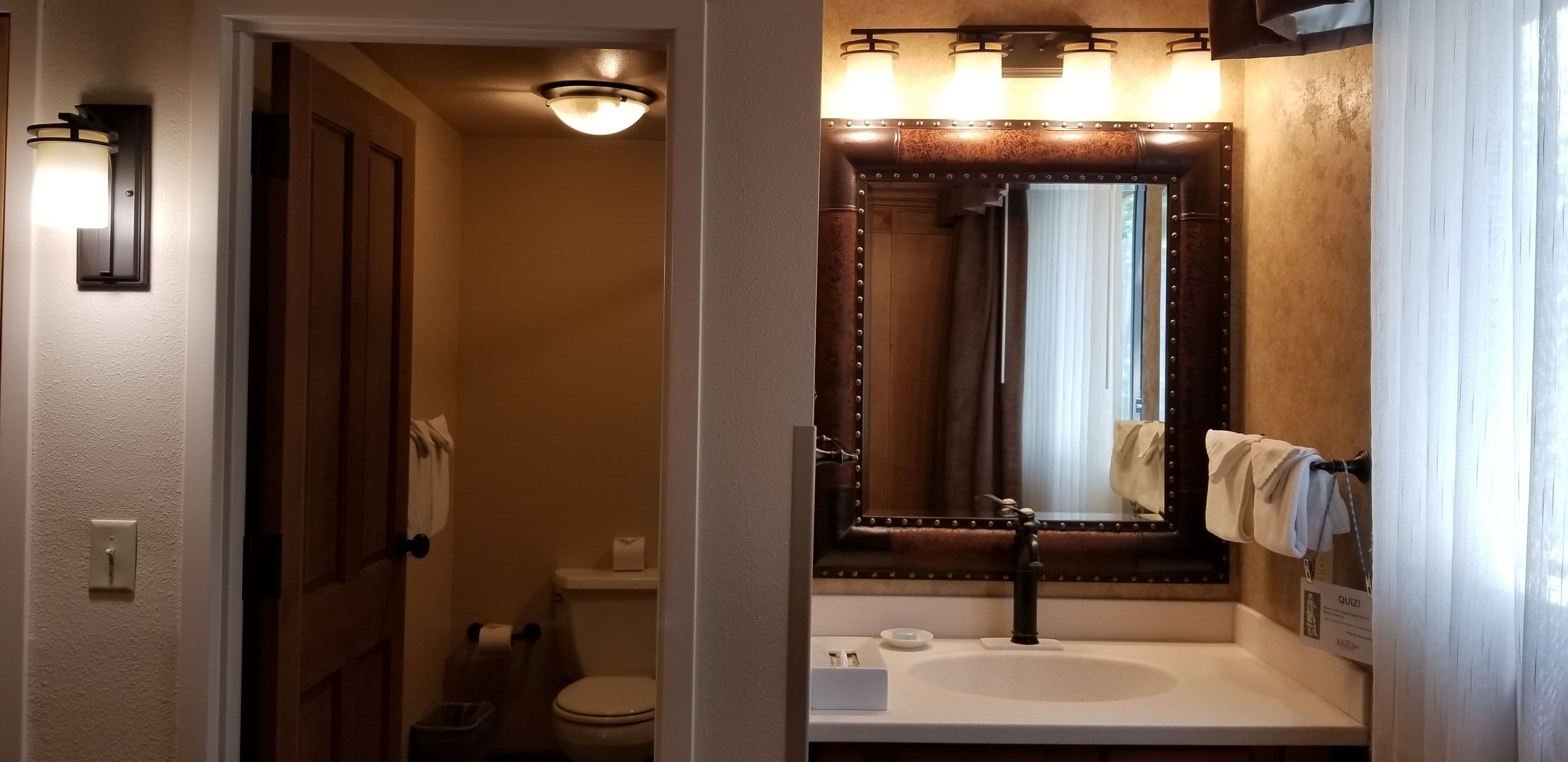 compact room, 1 queen bed, connecting rooms, courtyard area (stair access only) | bathroom | shower, rainfall showerhead, free toiletries, hair dryer