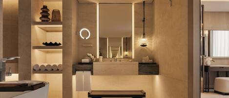 A modern bathroom with a bench, shelves with towels, a mirror with a ring light, and a hanging light fixture.