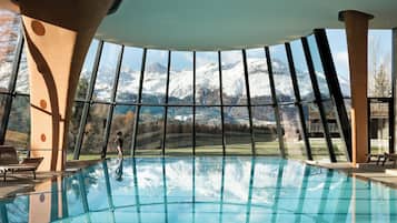 Indoor pool, open 7:00 AM to 8:00 PM, pool loungers