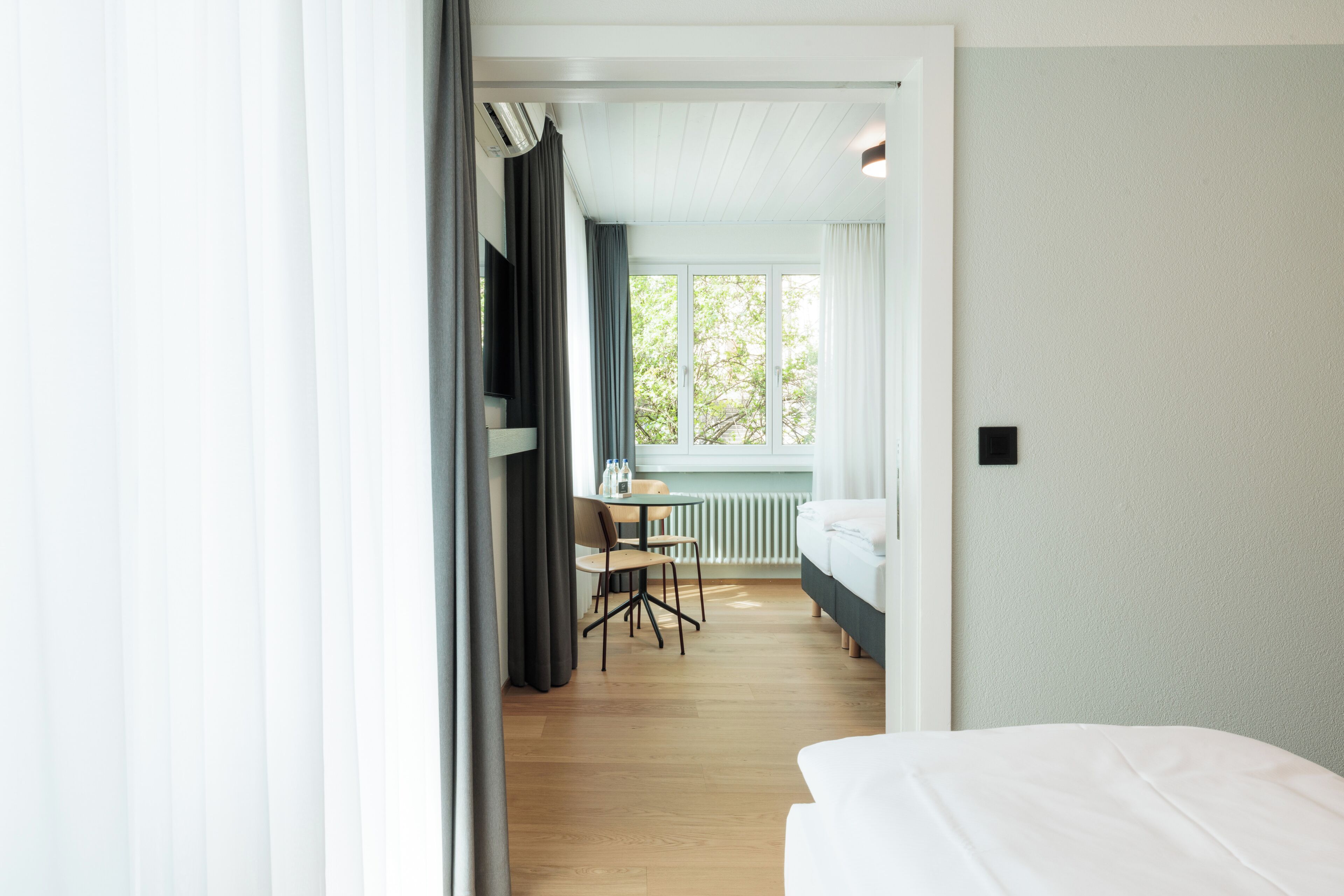 Family Suite, City View | Premium bedding, down comforters, in-room safe, desk