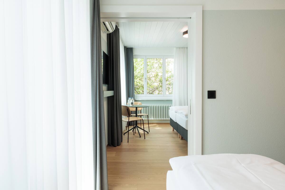 Family Suite, City View | Premium bedding, down comforters, in-room safe, desk