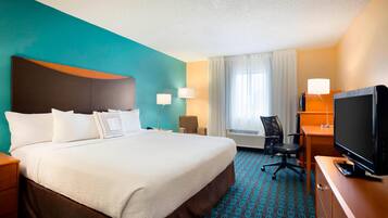 Desk, laptop workspace, blackout drapes, iron/ironing board