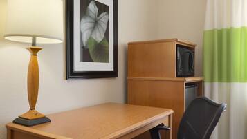 Desk, laptop workspace, blackout drapes, iron/ironing board