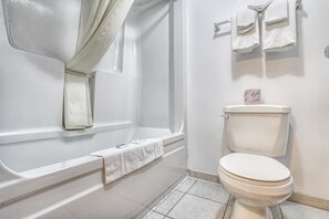 Combined shower/bathtub, hair dryer, towels, soap