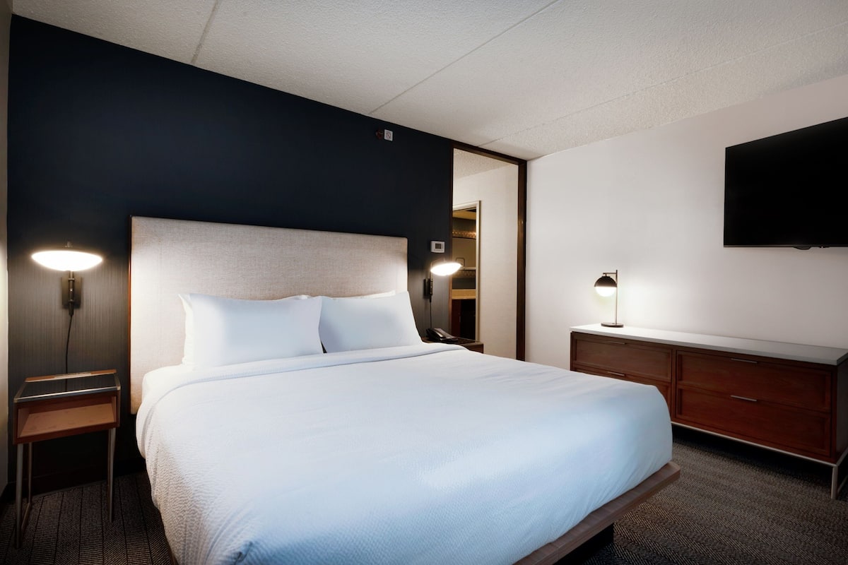 Premium bedding, pillow-top beds, desk, laptop workspace