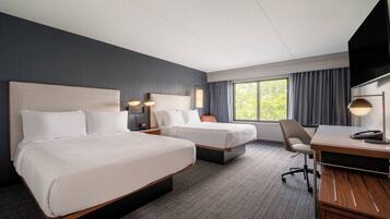 Premium bedding, pillowtop beds, desk, laptop workspace