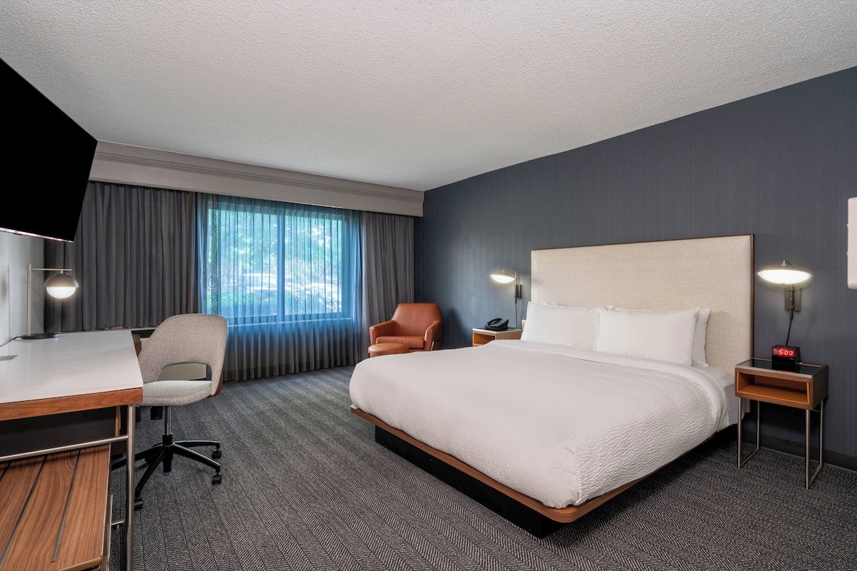 Premium bedding, pillow-top beds, desk, laptop workspace