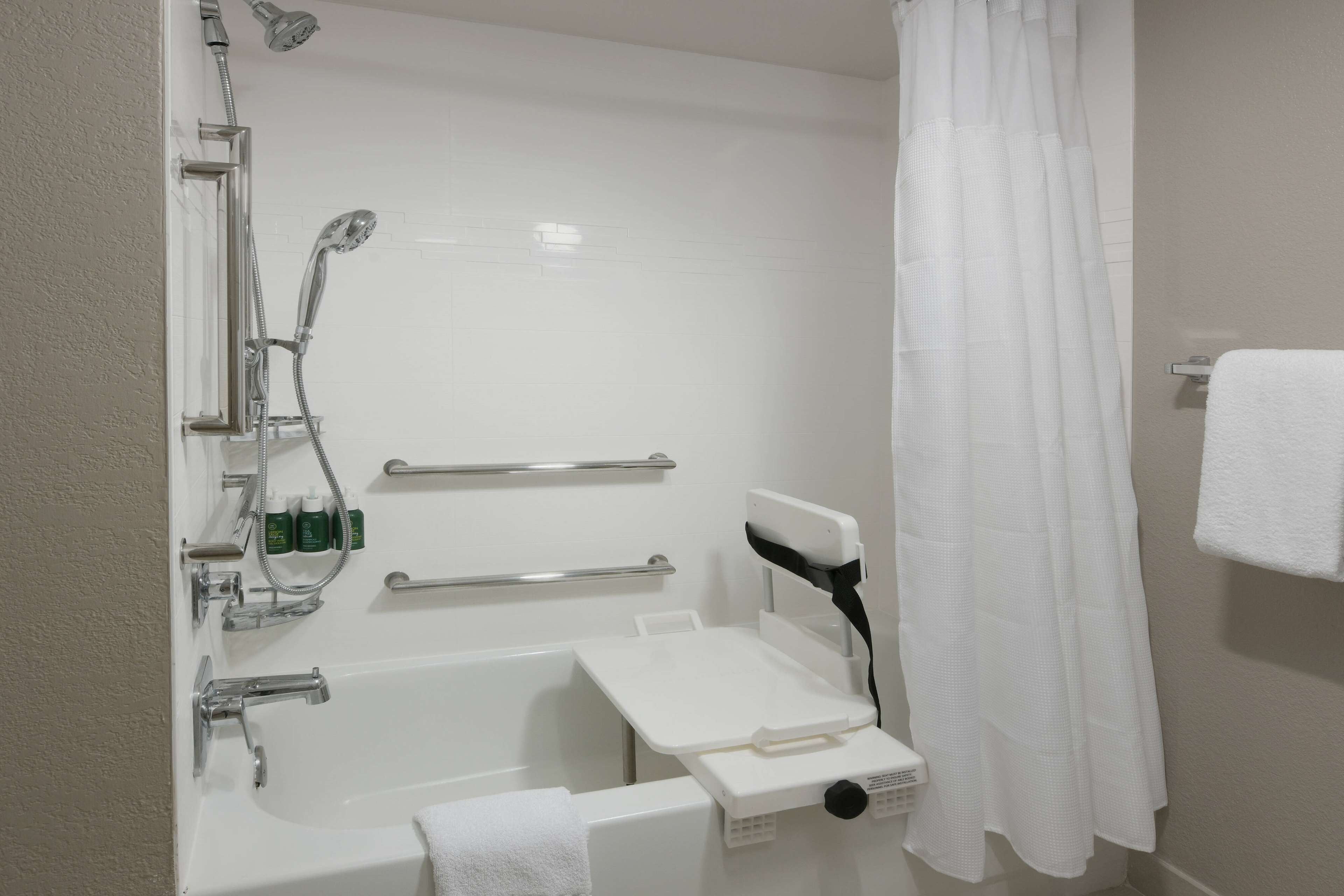 combined shower/bathtub, free toiletries, hair dryer, towels
