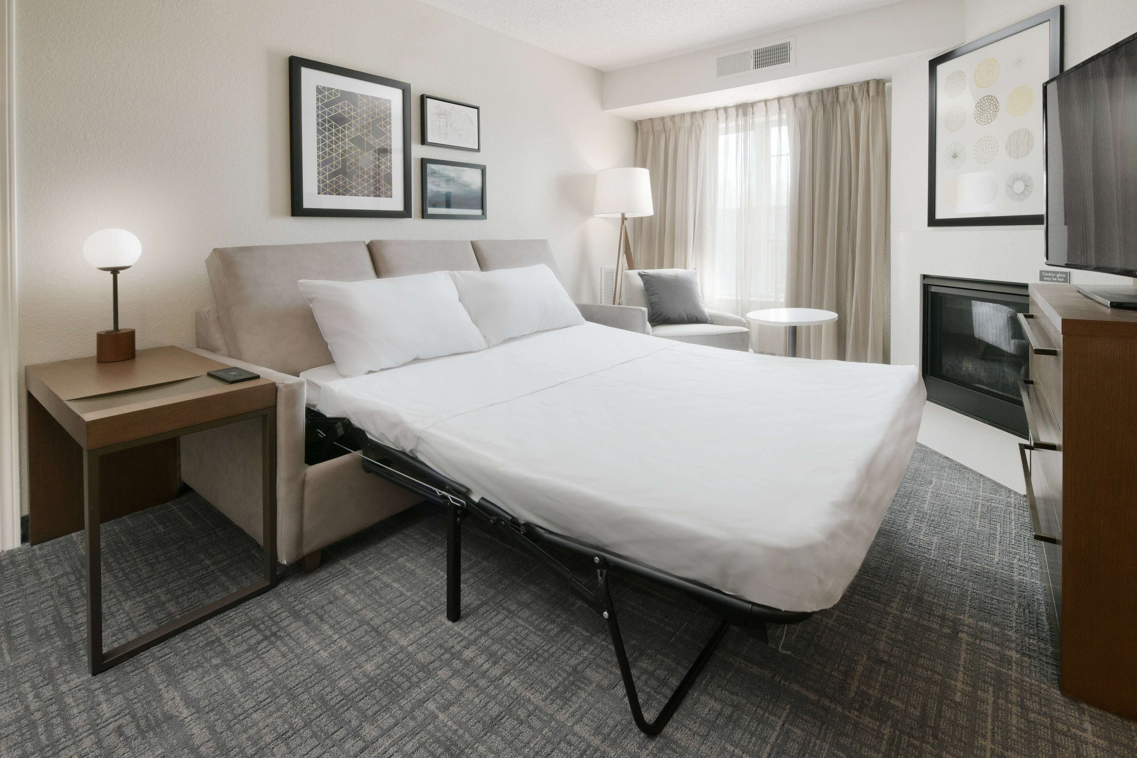 premium bedding, pillow-top beds, desk, laptop workspace