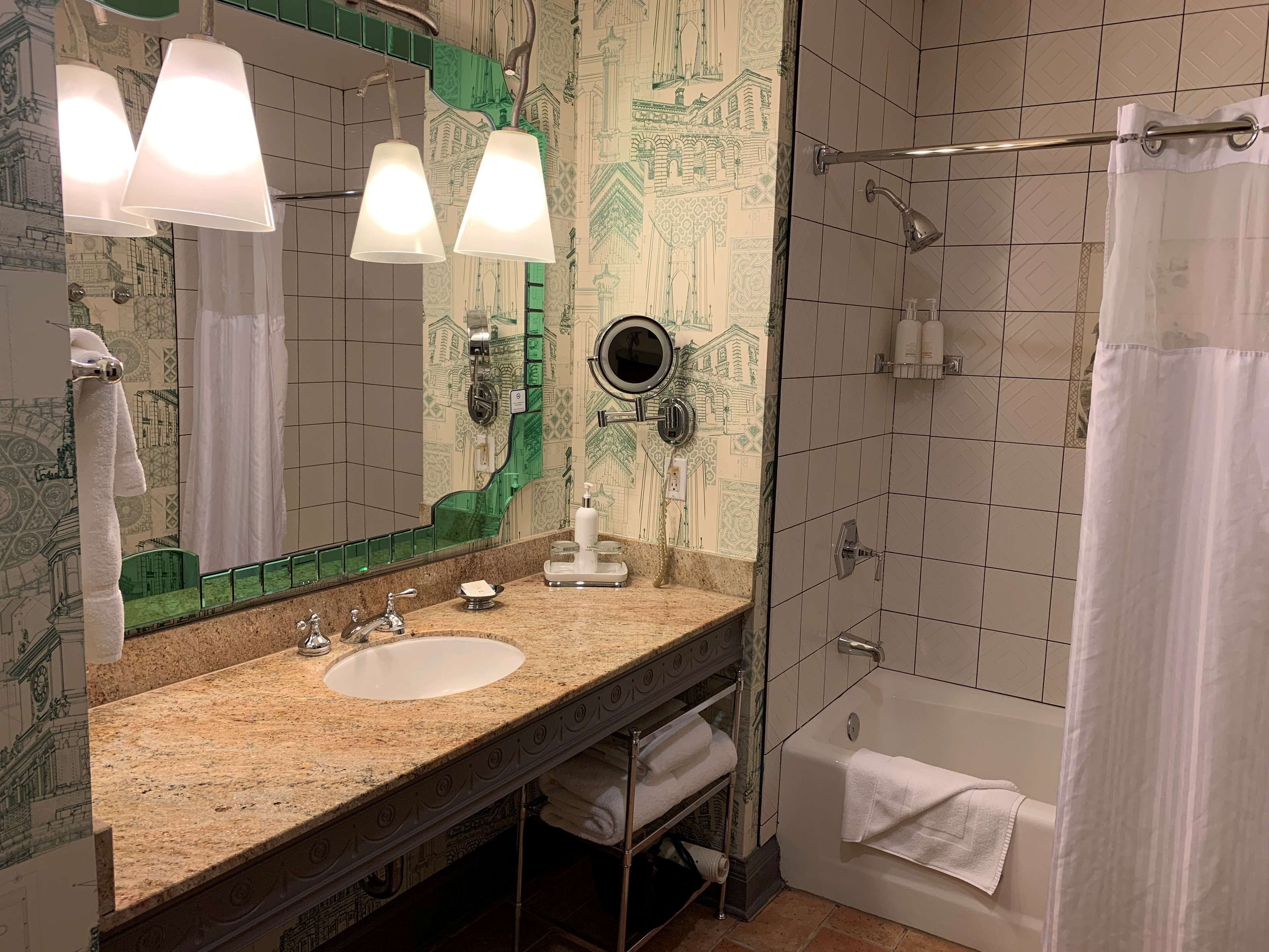 suite, 1 bedroom (2 queen beds) | bathroom | combined shower/bathtub, designer toiletries, hair dryer, bathrobes