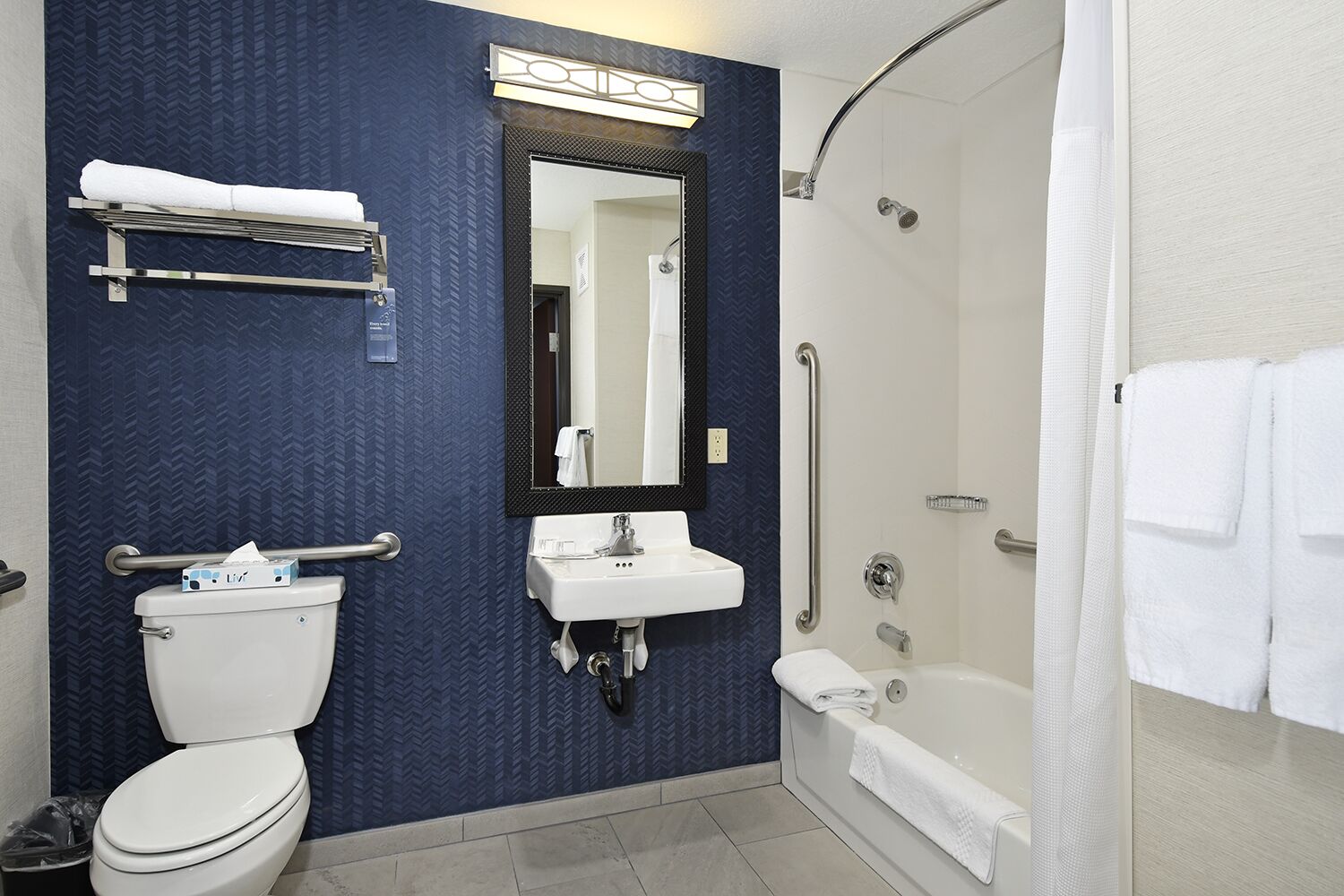 combined shower/bathtub, free toiletries, hair dryer, towels