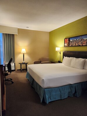 Deluxe Room, 1 King Bed, Mobility Accessible, Non Smoking (Hearing, Roll-in Shower) | Desk, laptop workspace, blackout drapes, iron/ironing board