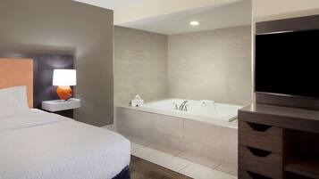 Studio, 1 King Bed, Non Smoking | Bathroom | Combined shower/tub, free toiletries, hair dryer, towels