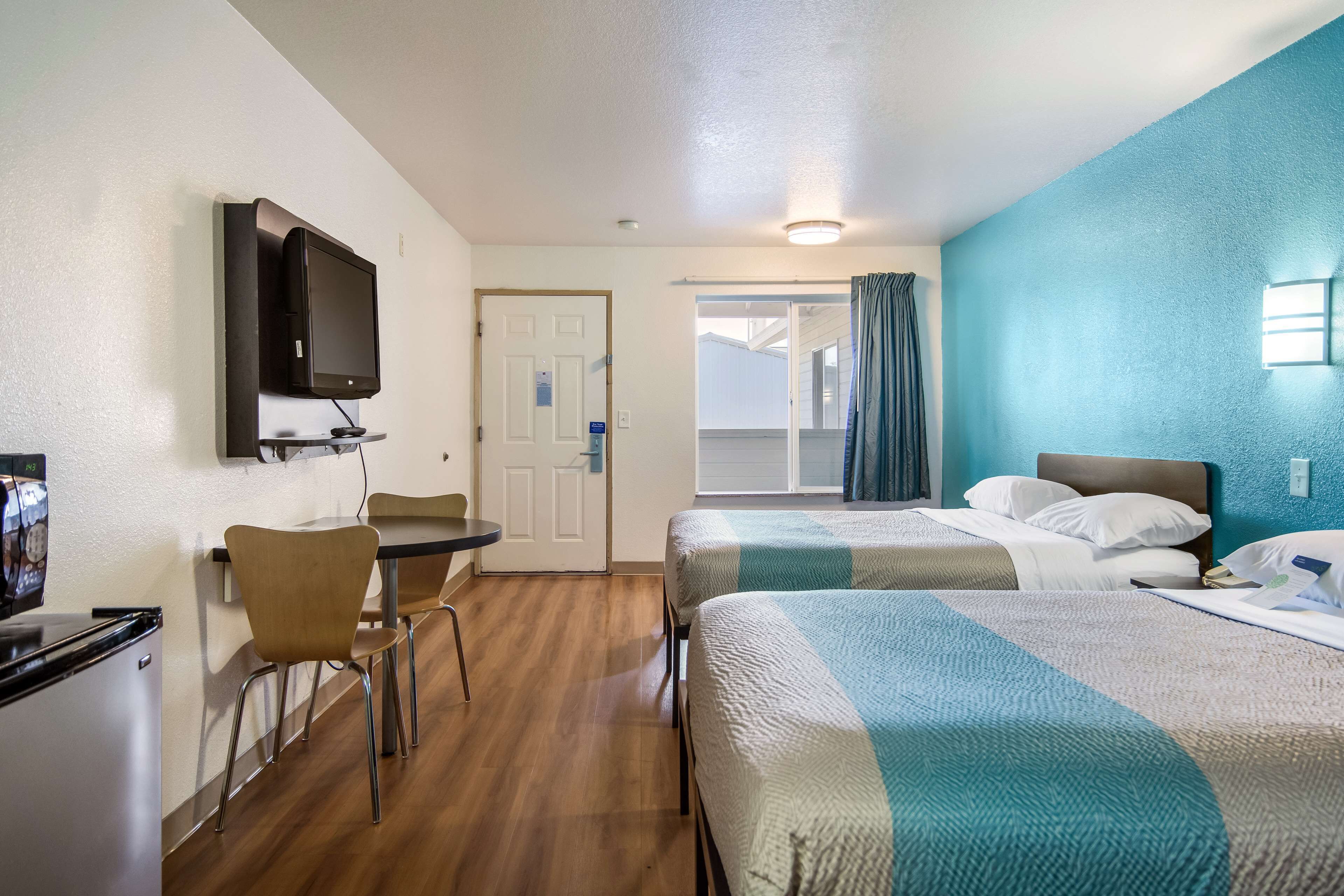 Blackout drapes, free WiFi, bed sheets, alarm clocks