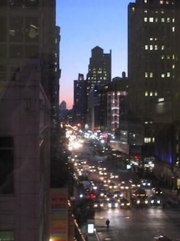 Front of property - evening/night at Americana Inn