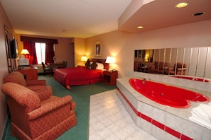 Standard Room, 1 King Bed, Jetted Tub | Bathroom | Combined shower/tub, free toiletries, hair dryer, towels