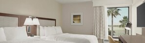 Hypo-allergenic bedding, desk, laptop workspace, blackout drapes